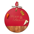 The Maple Acacia Heirloom Board Round in Red (20 x 16") features "Merry & Bright" in gold, a gold spreader, and ribbon—perfect as a personalized charcuterie board for festive gatherings.