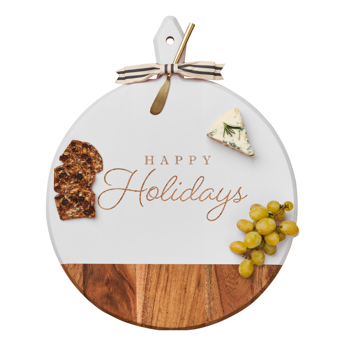 The Maple Acacia Heirloom Board, round in white (20 x 16"), features "Happy Holidays" and comes with a gold spreader and ribbon—an ideal personalized charcuterie board for festive gatherings.
