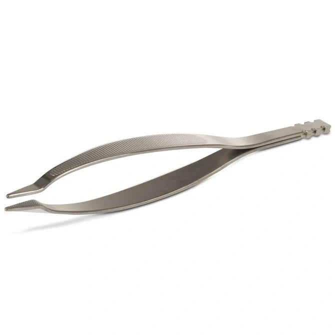 Metal tweezers on a white background