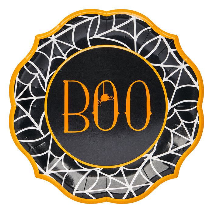 Elevate your Halloween tableware with the Sophistiplate Boo Treats Dinner Plates (8pk), featuring a round black design with a white spiderweb pattern, orange scalloped edge, and the word “BOO” in bold orange letters accented by a dangling spider. As part of the Boo Treats Collection, these festive plates are perfect for adding a spooky touch to your celebration.