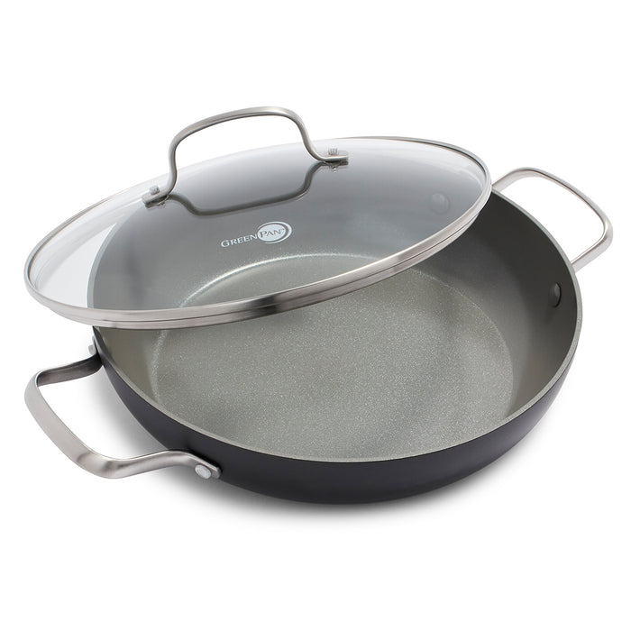 Gray ceramic nonstick everyday pan with glass lid and stainless handles on a white background.