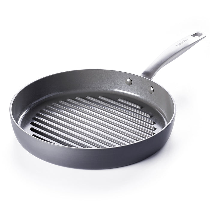 Gray ceramic grill pan with raised ridges, metal handle, and square shape, shown on a white background.