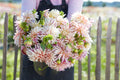 Café de Paris hand-tied bouquet of peach and cream roses with eucalyptus and mixed greenery, gift wrap
