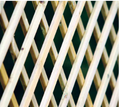 Wooden diamond lattice trellis panel for supporting climbing plants and garden screening