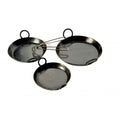 Cast iron skillets stacked on wooden display stand at Pengelly Garden Centre, heavy-duty frying pans for outdoor cooking