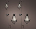 Hanging solar LED light bulb with filament-style warm glow for garden lighting