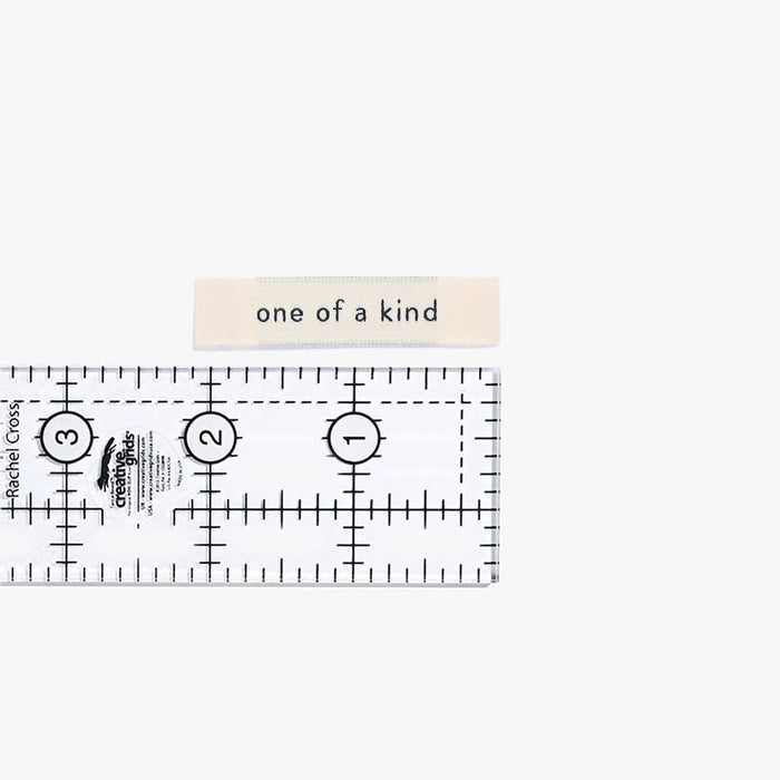 Kylie and the Machine - Woven Labels - "One Of A Kind"