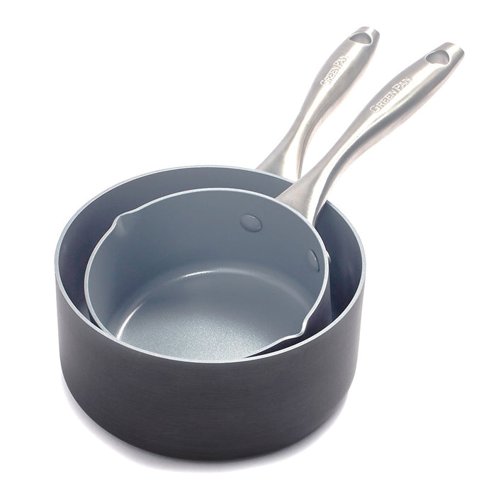 Two gray ceramic saucepans with metal handles, 1-quart and 2-quart, nested together on a white background.