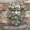 Bacchus stone garden statue holding grape cluster, weathered stone finish ornamental sculpture for patio or borders