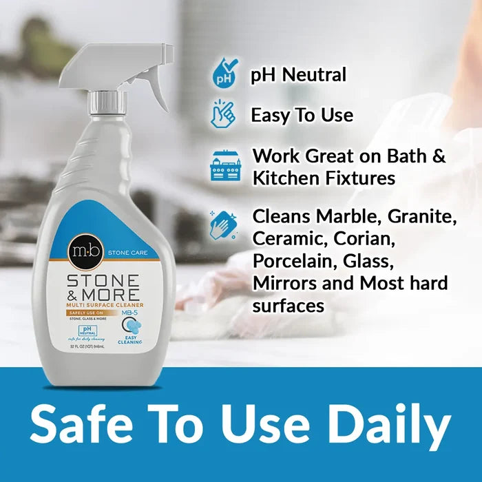 Spray bottle with cleaning solution labeled 'Stone & More' on a blurred background
