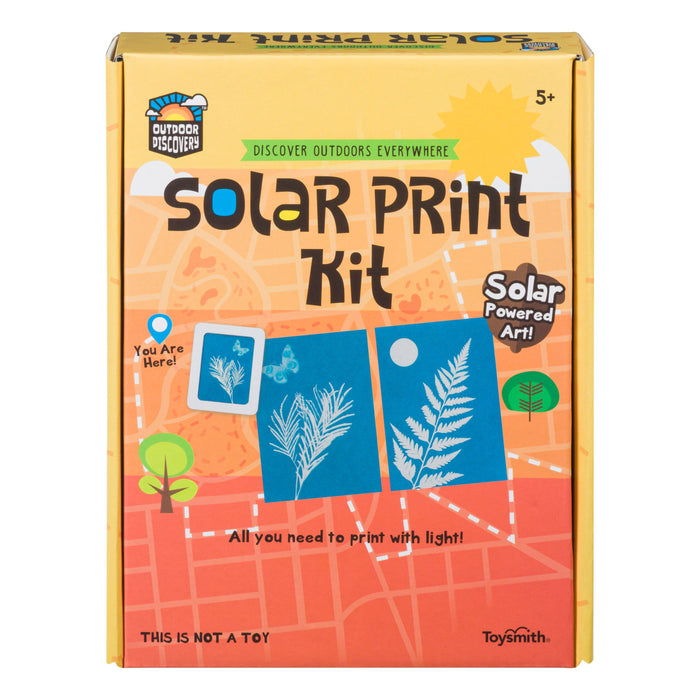 A yellow and orange box labeled Outdoor Discovery Solar Print Kit by Outdoor Discovery for ages 5+ features nature-inspired art and sun prints. The text says, "All you need to print with light!.