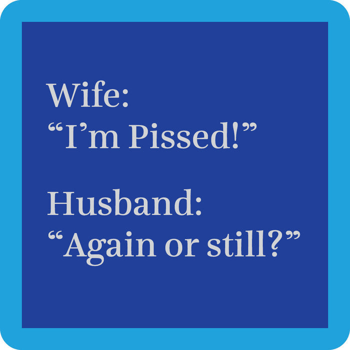 The Pissed Coaster by Drinks On Me features a dark blue square with rounded corners and white text: Wife: “I’m Pissed!” Husband: “Again or still?” A funny housewarming gift or quirky addition to your bar cart; lighter blue border included.