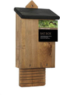 Wooden bat box with sloped roof and entrance slot, mounted on tree providing garden wildlife habitat
