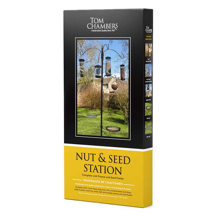 Wooden nut and seed station for wild birds with glass jars of peanuts and mixed birdseed, wall-mounted garden feeder