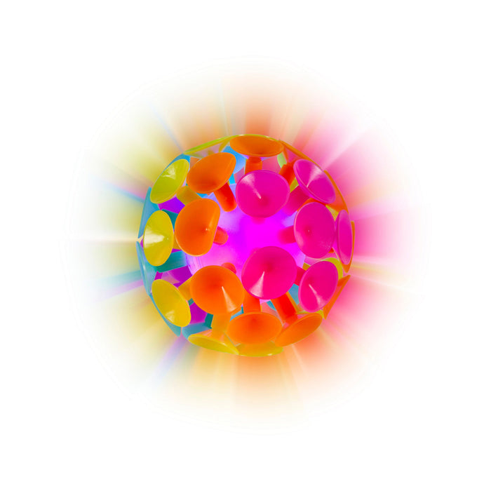 The Toysmith Jumbo Suction Ball by Toysmith features bright petal-like shapes in orange, yellow, and pink. This sensory toy lights up with vibrant colors, creating a glowing effect—perfect for kids ages 3+ against a white background.