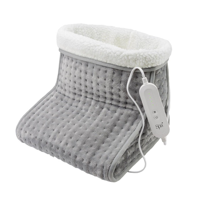 Gray heating pad with white top on a white background- Buy Now Cream Luxury Heated Throw + Foot Warmer